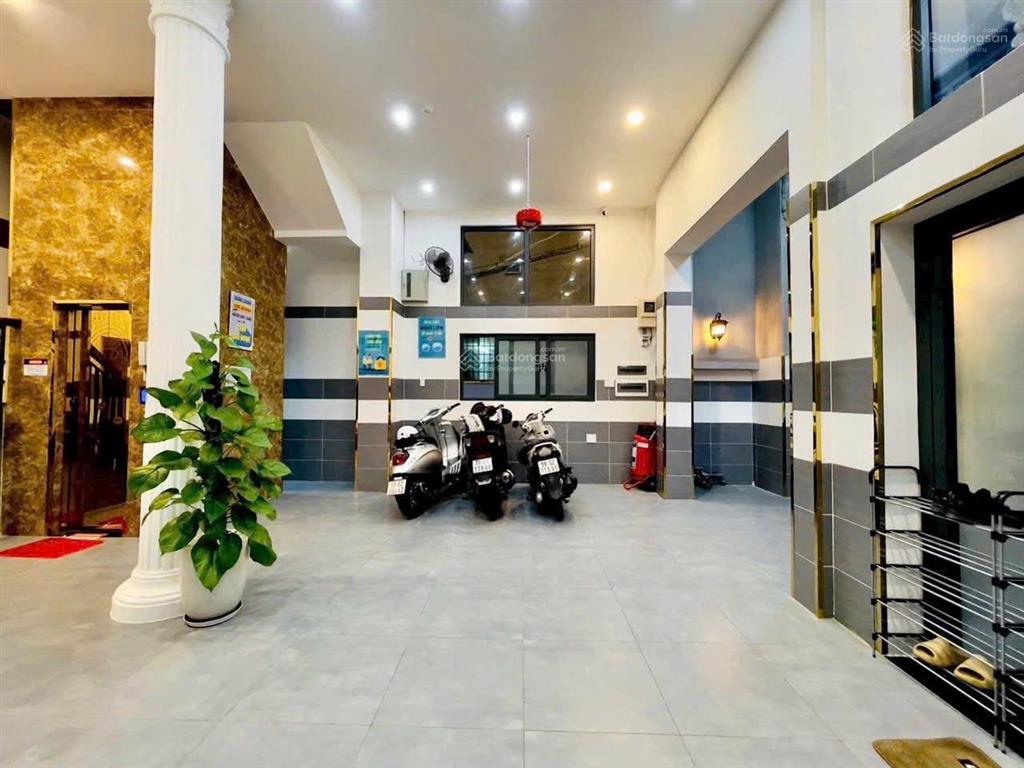 Chdv 2 mặt tiền hẻm thông 7m lê quang định 1 trục. 15 phòng cao cấp + thang máy  cho thuê 125tr/ t