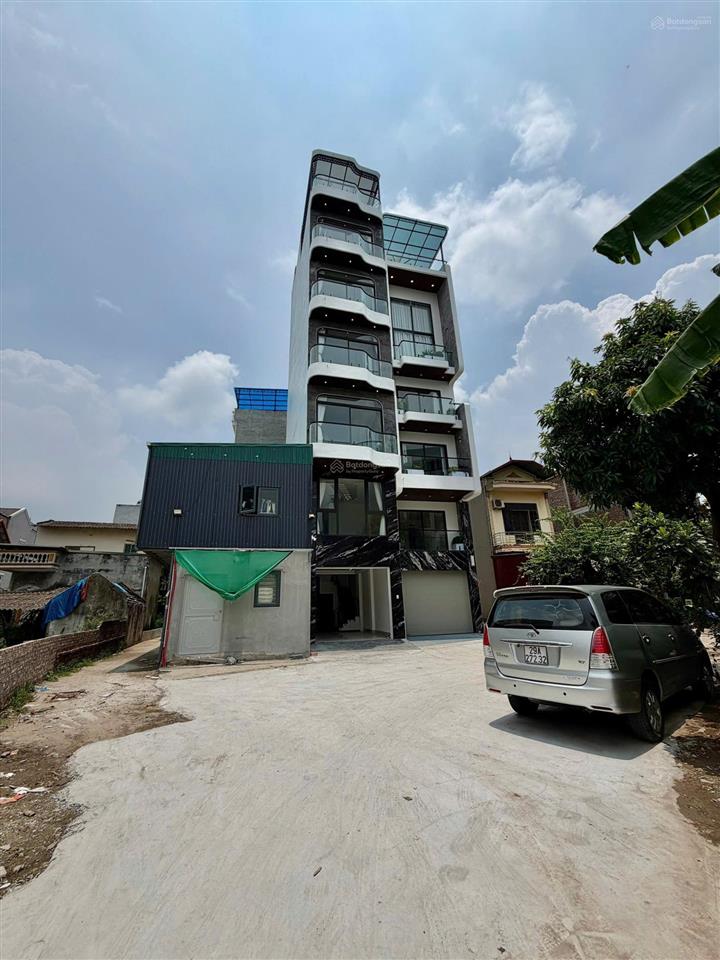 Bán nhà 7 tầng thang máy mặt hồ đầm tranh long biên 51m2 gara ô tô, full nội thất, giá 14,6 tỷ