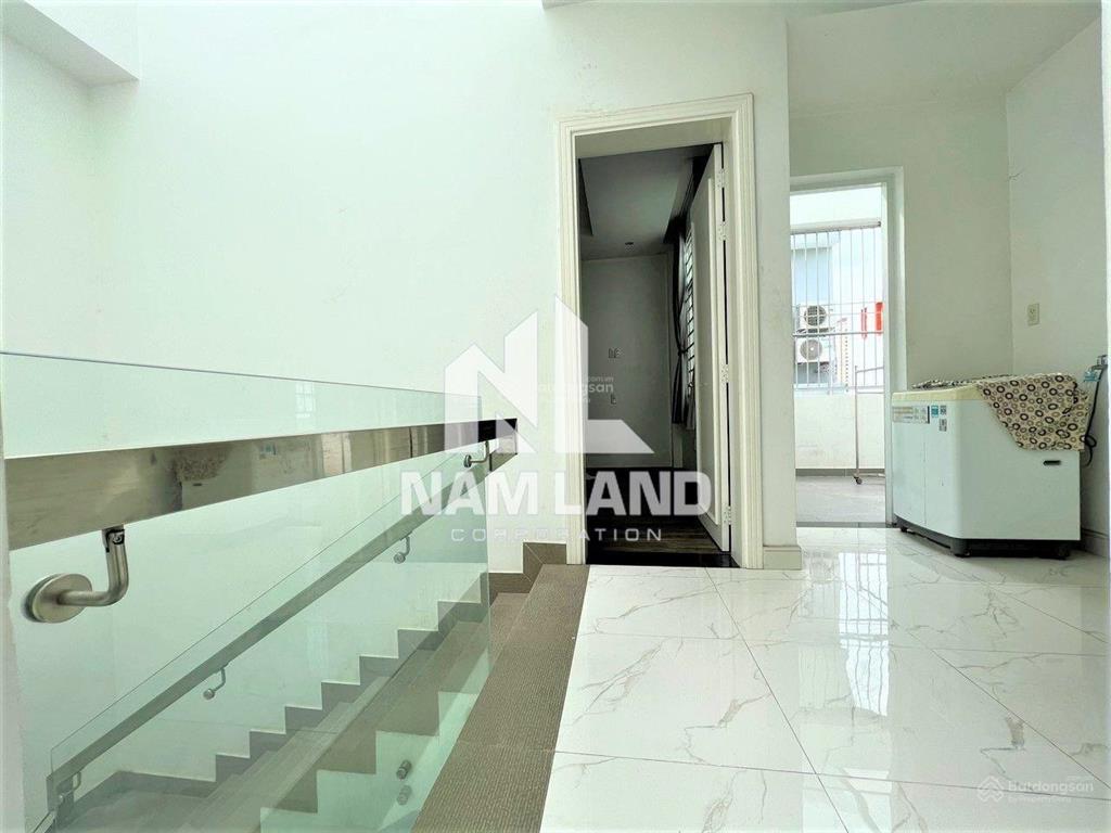 Cho nhà khu an ninh ngang 8m gara trệt 3 lầu 5 phòng để ở, văn phòng công ty gần đường trần não q.2