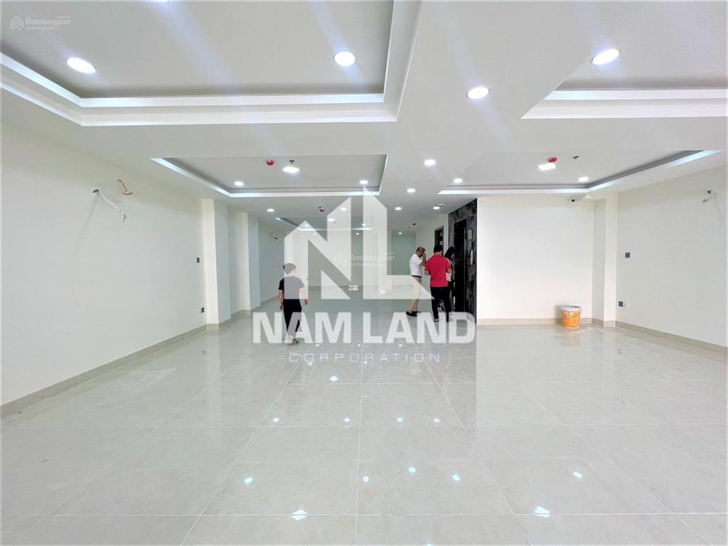 Cho thuê nhà xây trống suốt có thang máy làm văn phòng, có hầm 4 lầu tại gần trần não, quận 2