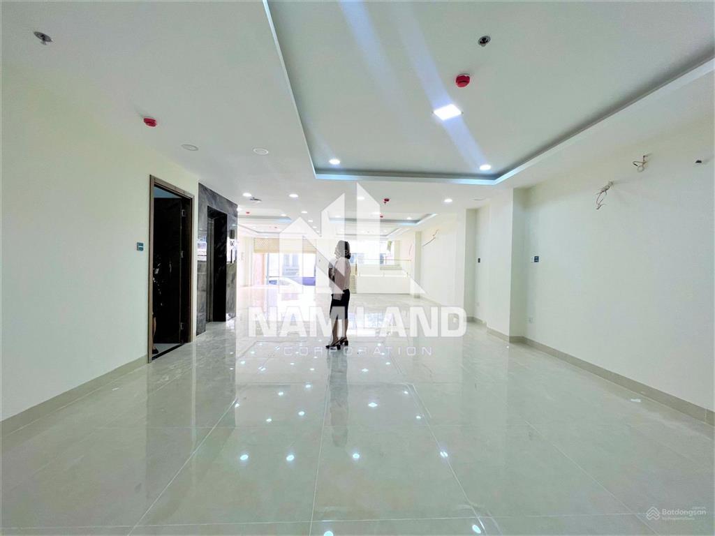 Cho thuê nhà xây trống suốt có thang máy làm văn phòng, có hầm 4 lầu tại gần trần não, quận 2