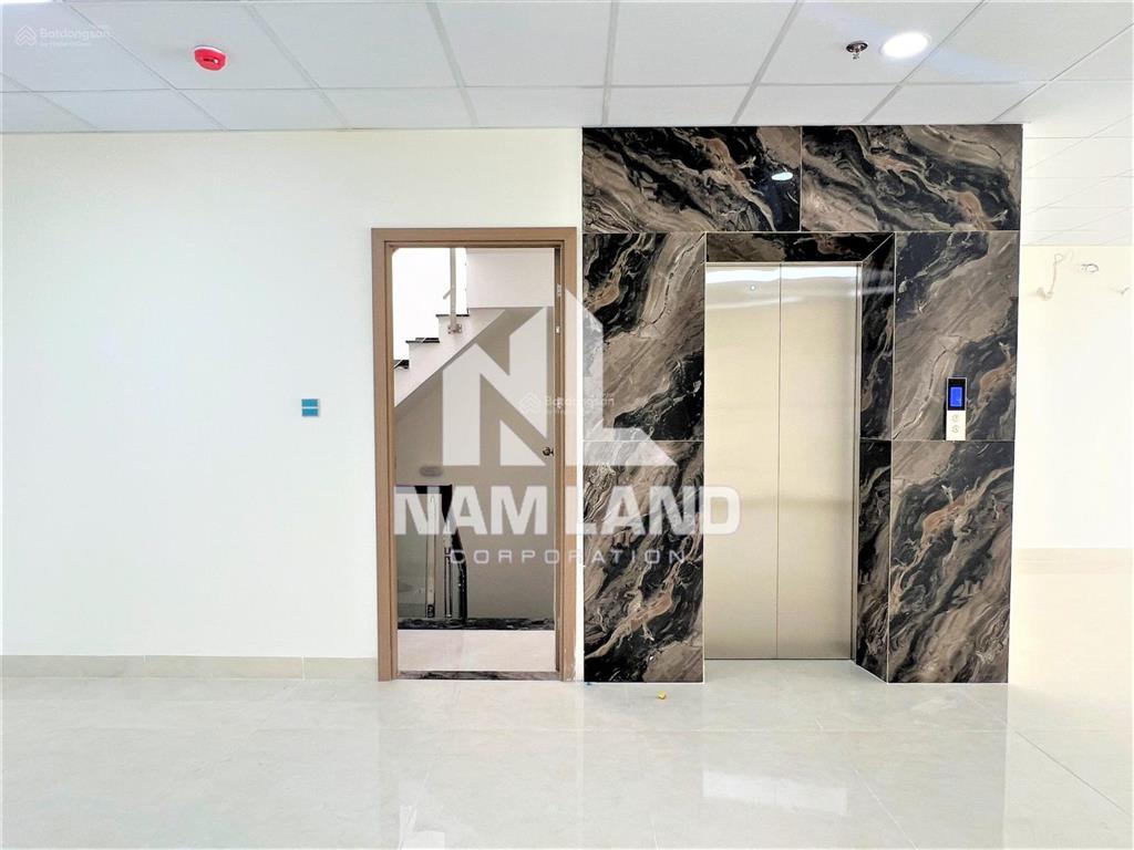 Cho thuê nhà xây trống suốt có thang máy làm văn phòng, có hầm 4 lầu tại gần trần não, quận 2