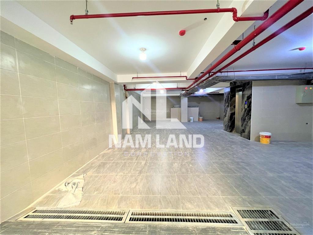 Cho thuê nhà xây trống suốt có thang máy làm văn phòng, có hầm 4 lầu tại gần trần não, quận 2