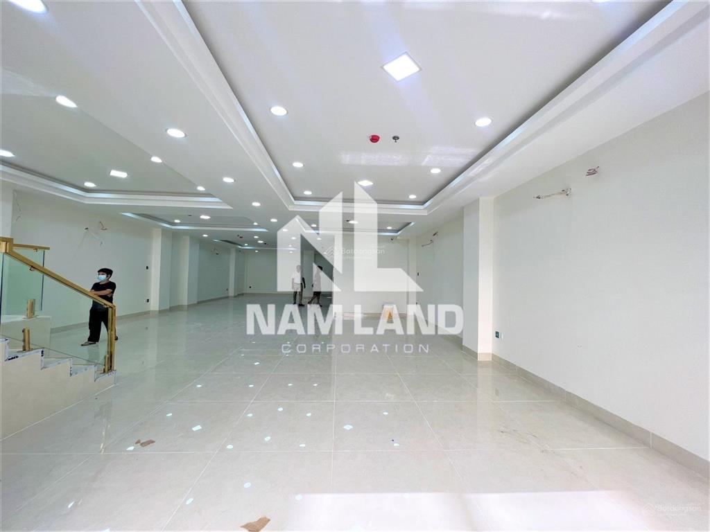 Cho thuê nhà xây trống suốt có thang máy làm văn phòng, có hầm 4 lầu tại gần trần não, quận 2