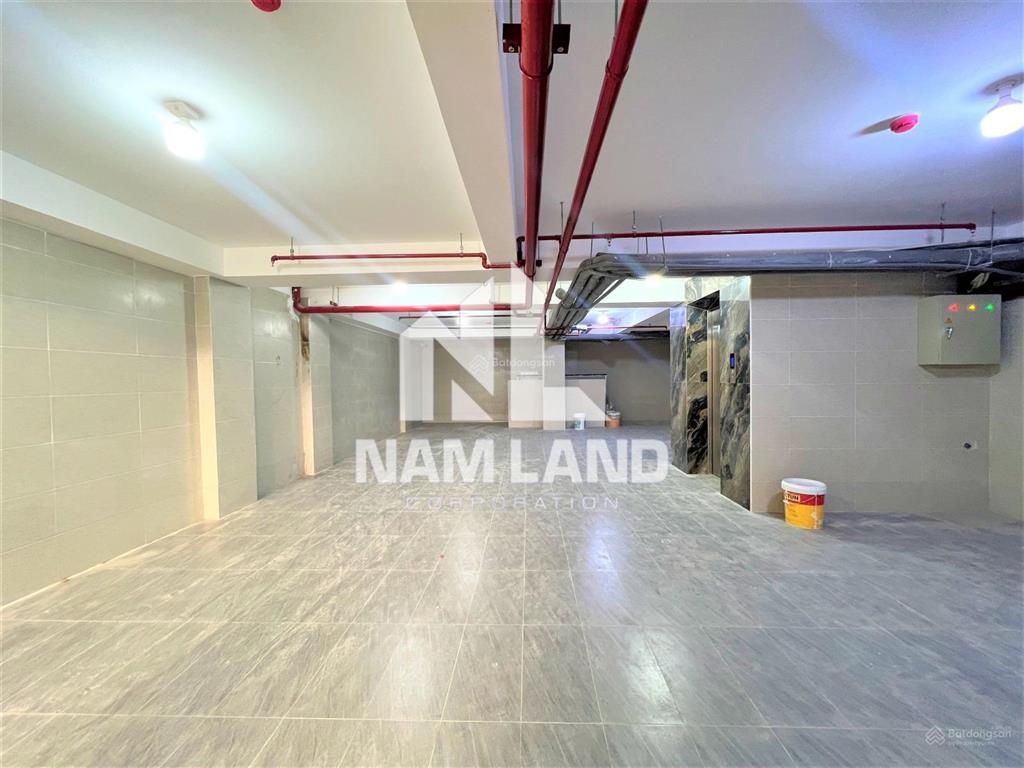 Cho thuê nhà xây trống suốt có thang máy làm văn phòng, có hầm 4 lầu tại gần trần não, quận 2