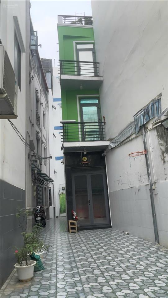 Bán nhà 30m2, 1 trệt 2 lầu sân thượng, 2 pn, sẵn sổ tại thích quảng đức, p.3, q.phú nhuận
