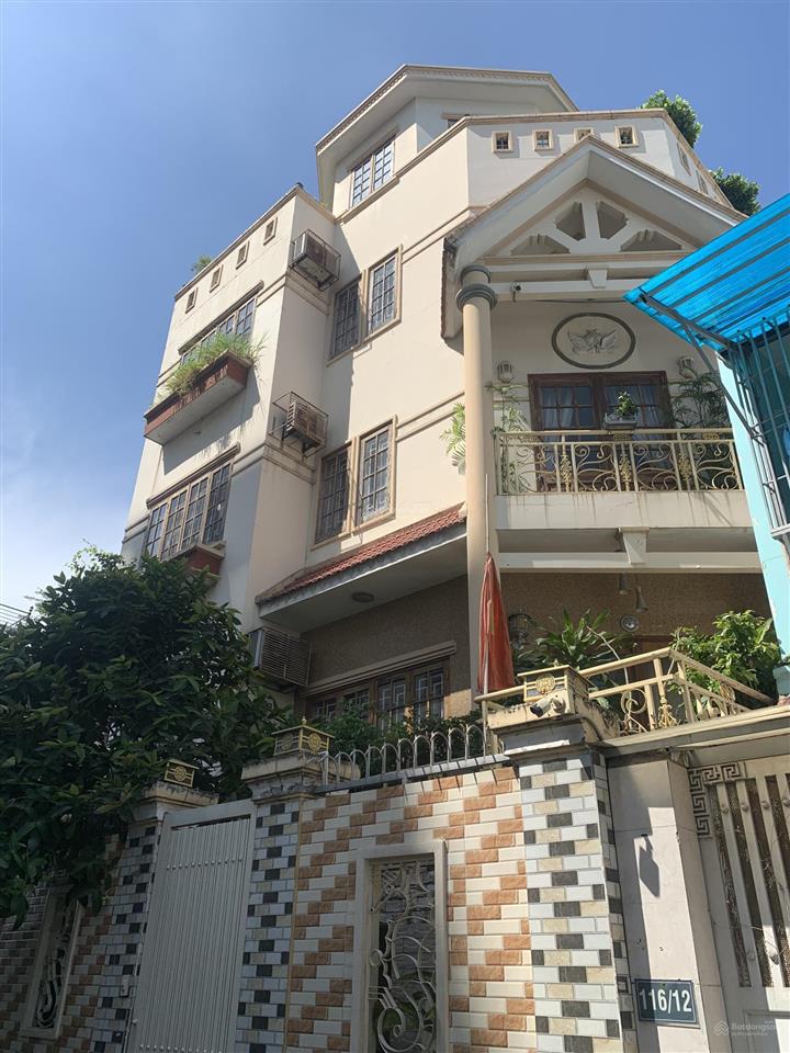 Nhà oto đậu trong nhà huỳnh tấn phát q7  4lầu + máy che. xây kiên cố. giá 14.9ty.  0901 311 ***