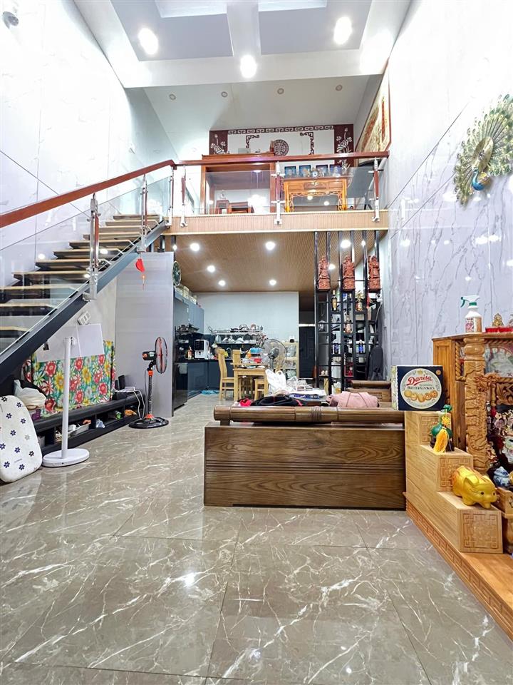 Bán nhà 1 trệt 1 lửng ( 133m2  3pn sân xe hơi đường xe hơi quay đầu