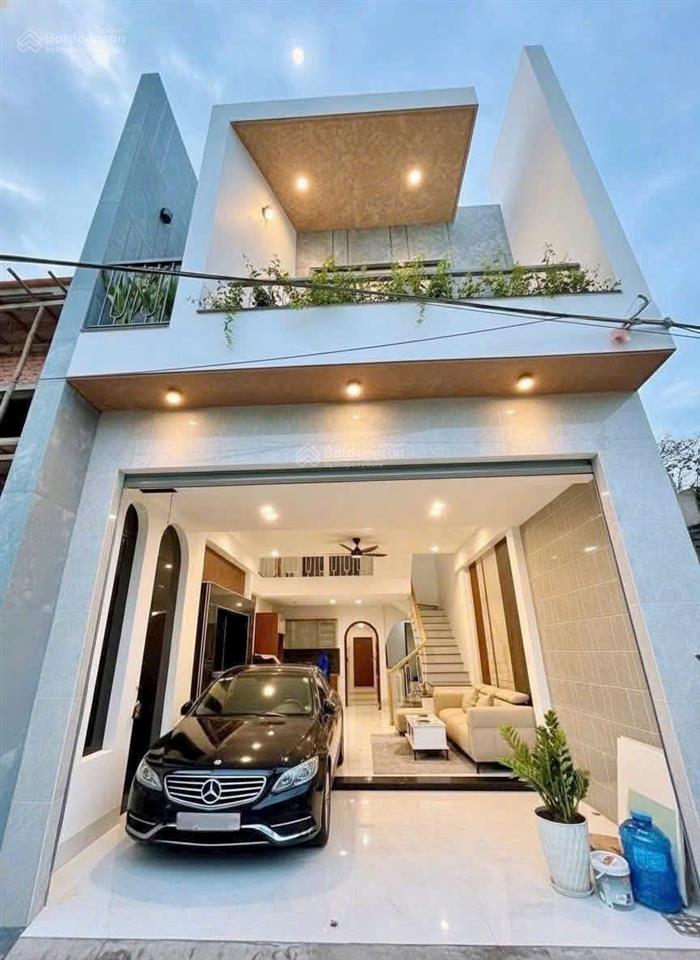 Bán nhà lầu mới, sr,tc, sân oto, đường oto, gần chợ tân hiệp, chỉ 2tỷ850