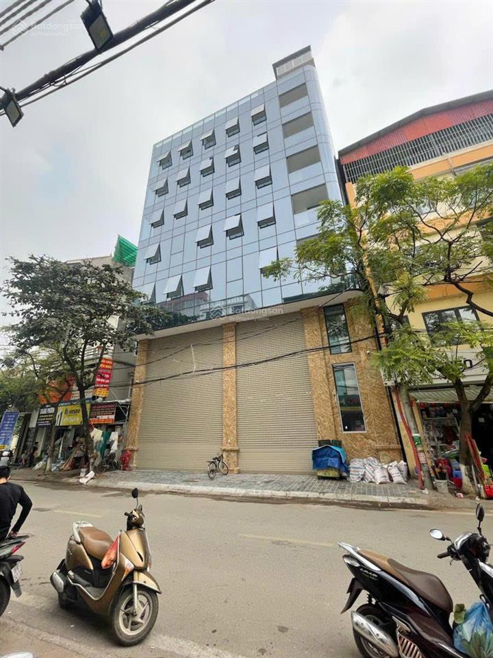 Bán tòa nhà văn phòng 144m2 xây 8t nổi 1t hầm, mặt khuất duy tiến, thang máy nhập đức, vỉa hè khủng
