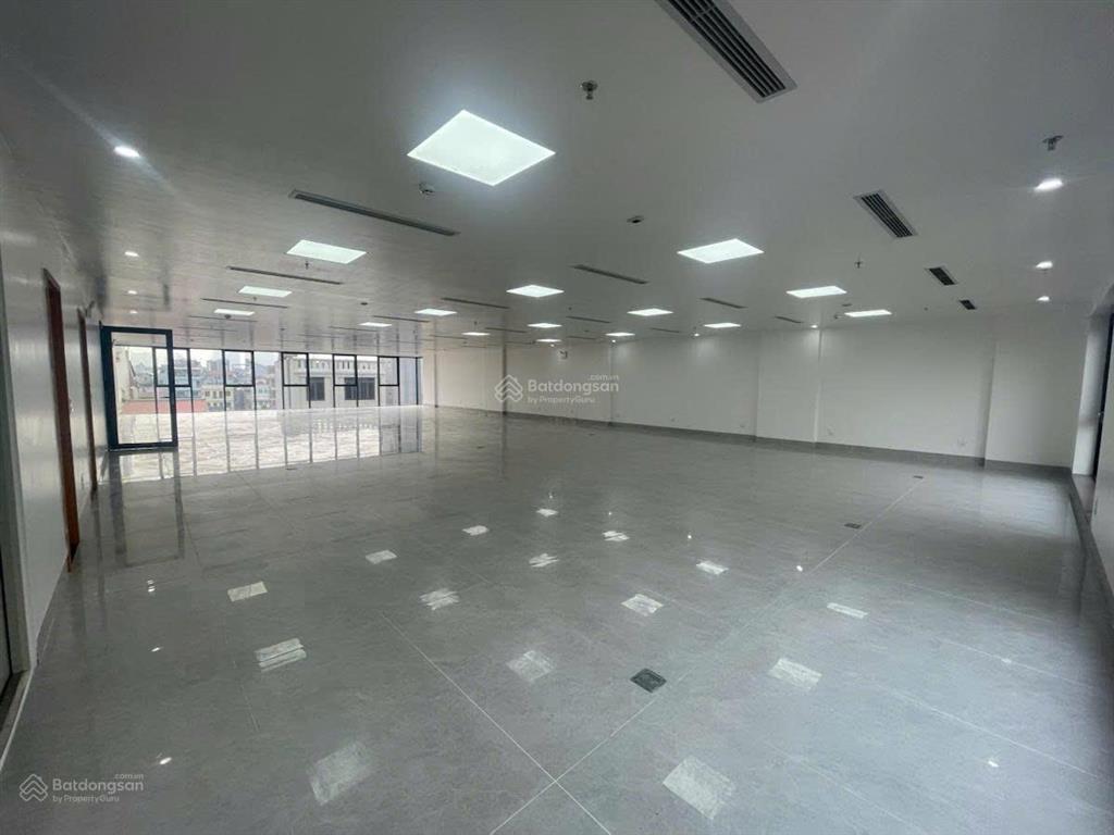 Bán tòa nhà văn phòng 144m2 xây 8t nổi 1t hầm, mặt khuất duy tiến, thang máy nhập đức, vỉa hè khủng