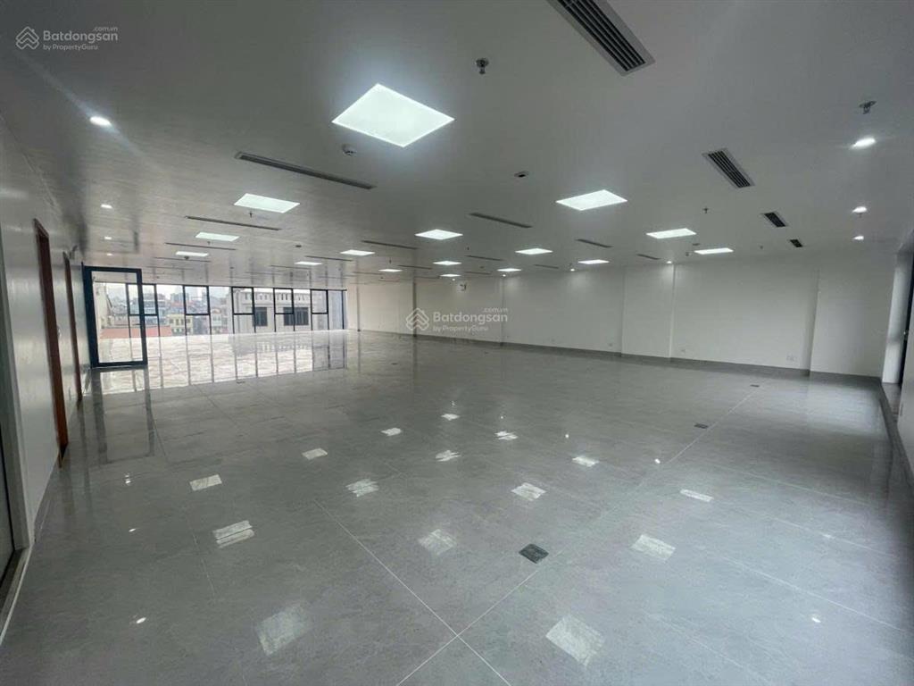 Bán tòa nhà văn phòng 144m2 xây 8t nổi 1t hầm, mặt khuất duy tiến, thang máy nhập đức, vỉa hè khủng