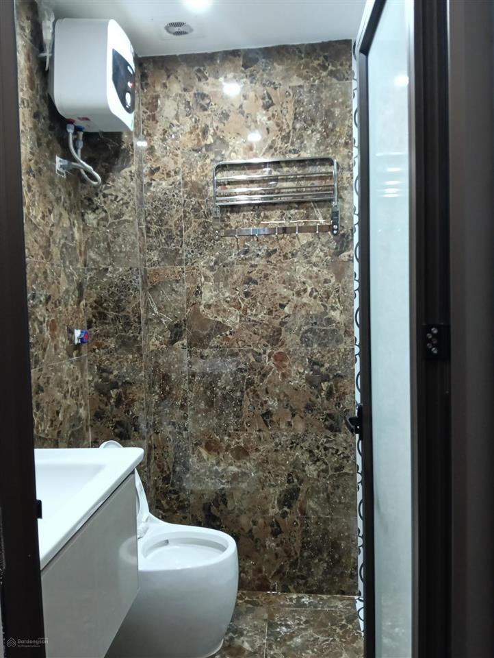 Bán nhà 6 tầng thang máy ôtô đỗ cửa phố thái hà đống đa hn dt 34m2  mr công0977 135 ***