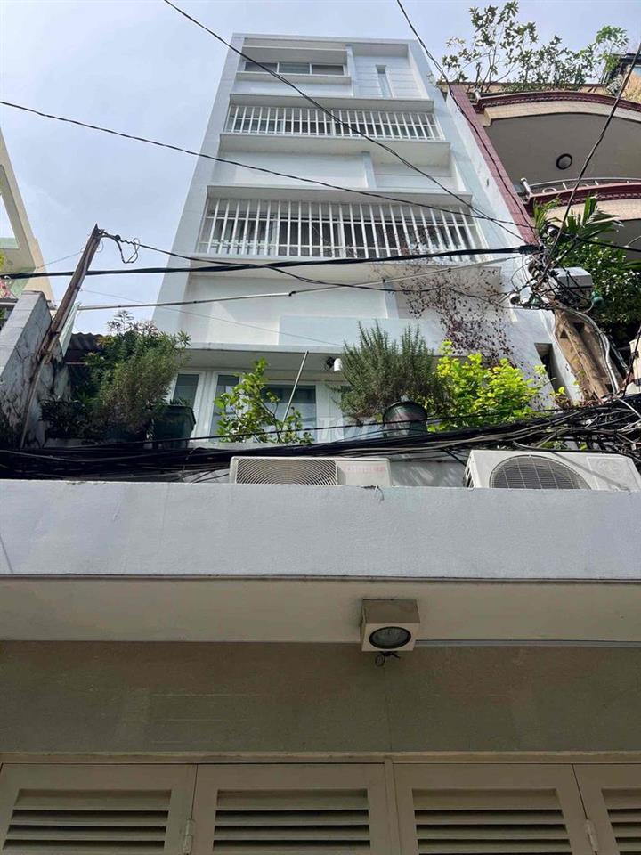 Tôi cần bán nhà hẻm 5m xe hơi đường Nguyễn Cảnh Chân Quận 1