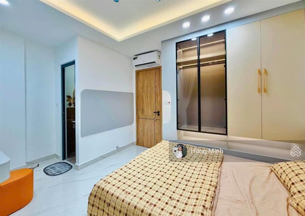 Nhà mới, hẻm xe hơi quang trung, dt 7x14m, 3 lầu, 6 phòng ngủ, full nội thất