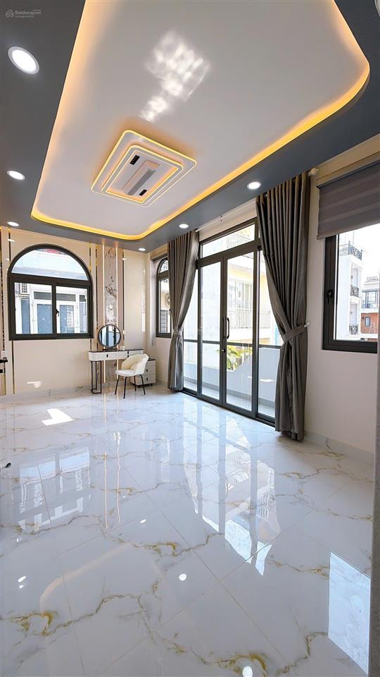 Mua bán nhà quận 4, 35m2 đất, 4 tầng, đường số xe hơi, trục đường tân vĩnh !