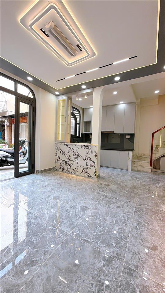 Mua bán nhà quận 4, 35m2 đất, 4 tầng, đường số xe hơi, trục đường tân vĩnh !