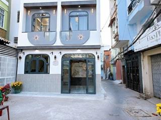 Mua bán nhà quận 4, 35m2 đất, 4 tầng, đường số xe hơi, trục đường tân vĩnh !