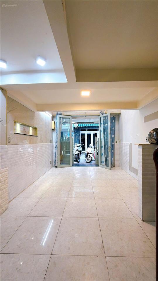 Mua bán nhà quận 4, đường số xe hơi, 5 tầng hoàn công, sát q1 thông vĩnh hội.