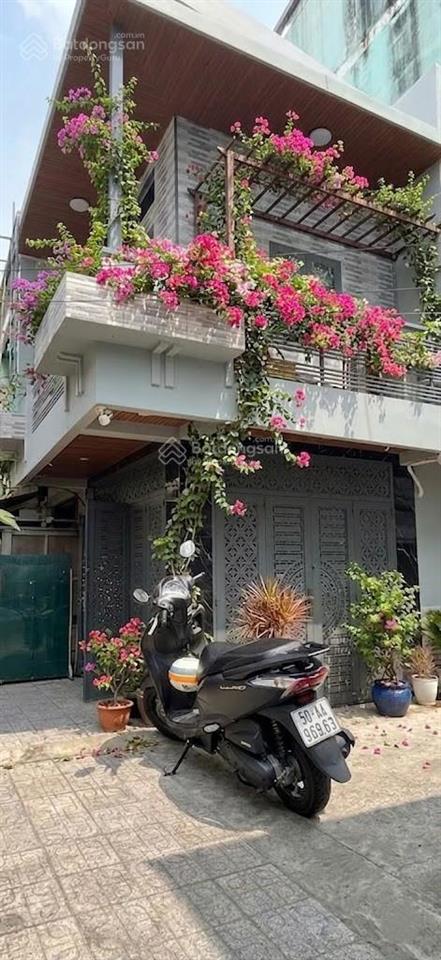 Mua bán nhà quận 4, 2 tầng, căn góc, đường số xe hơi, phường khánh hội !