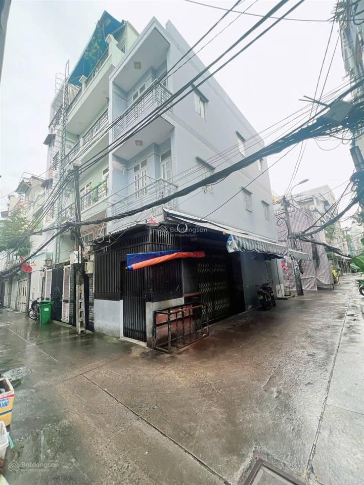 Mua bán nhà quận 4, 3 tầng, view góc 3 mặt tiền, đường số xe hơi, ngay tân vĩnh !
