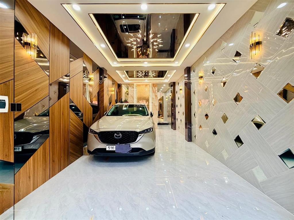 Bán nhà mặt tiền tân sơn p12 gò vấp 4x20 trệt lửng 5 lầu có thang máy