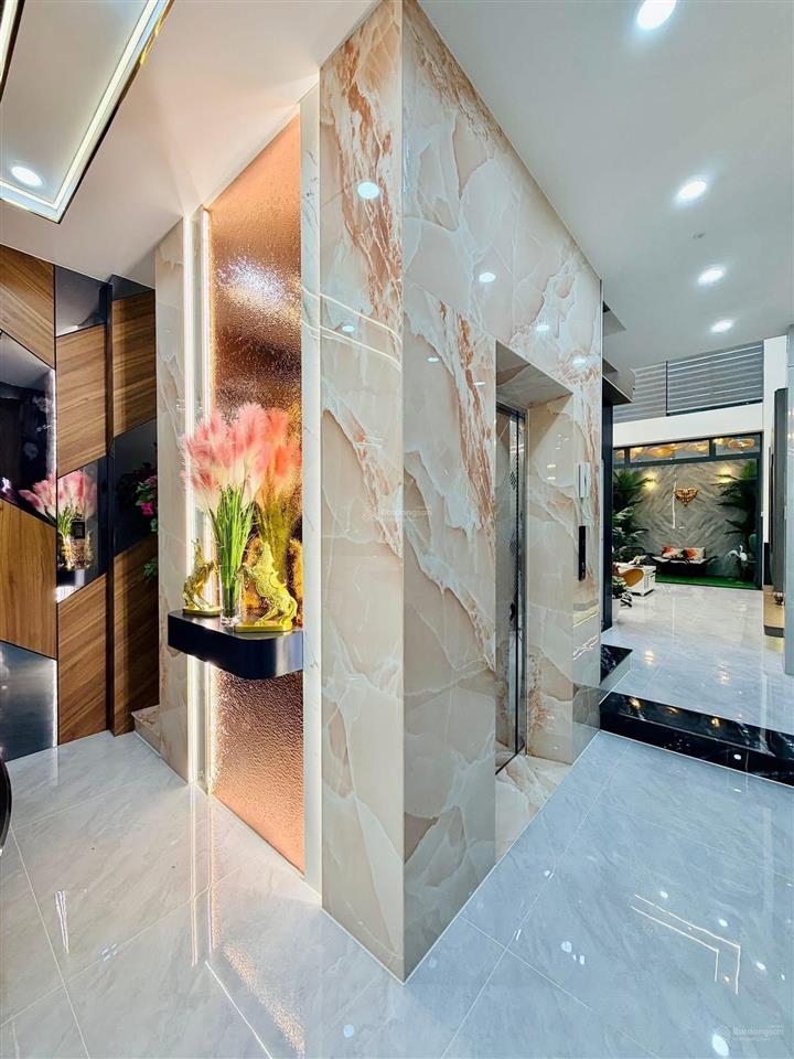 Bán nhà mặt tiền tân sơn p12 gò vấp 4x20 trệt lửng 5 lầu có thang máy