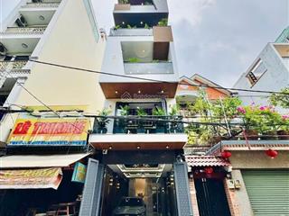 Bán nhà mặt tiền tân sơn p12 gò vấp 4x20 trệt lửng 5 lầu có thang máy