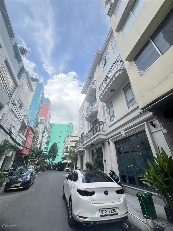 Bán nhà hẻm 8m đường hoàng hoa thám  cổng nhà ga t3 ( 7.2x21m, gpxd 1 hầm 7 tầng)