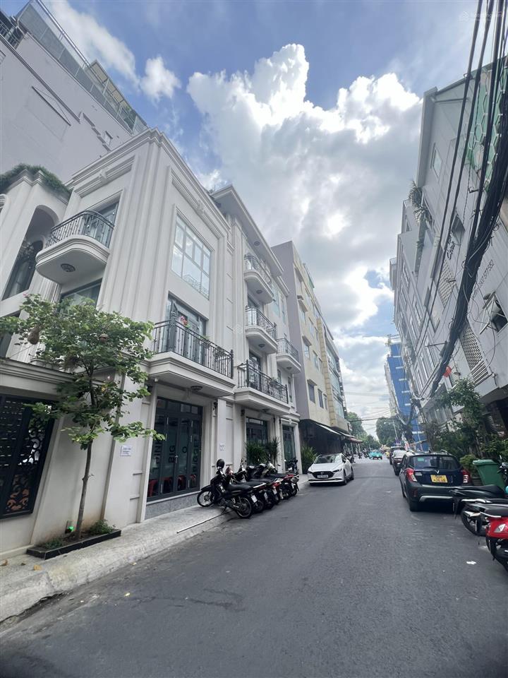 Bán nhà hẻm 8m đường hoàng hoa thám  cổng nhà ga t3 ( 7.2x21m, gpxd 1 hầm 7 tầng)