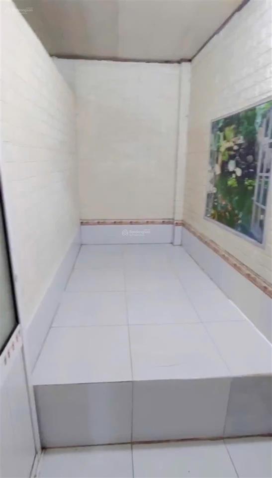 Nhà 42m2 mt đường nhựa lô 2, sổ hồng riêng