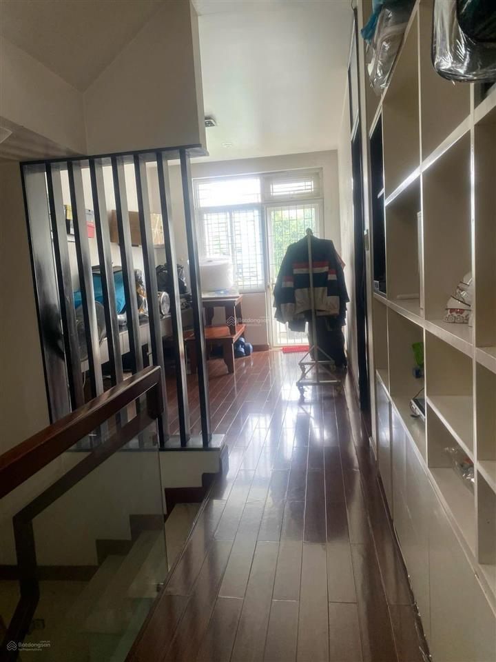 Bán nhà 2 lầu mặt tiền đường số  p. tân quy. diện tích 7x18m