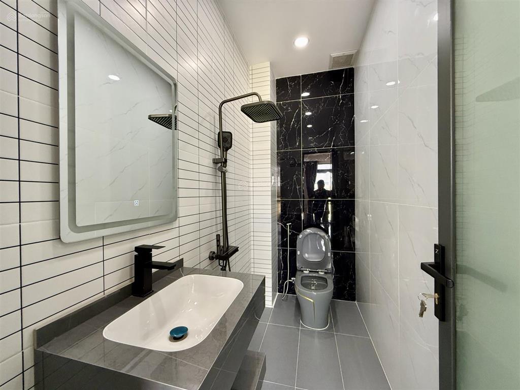 Nhà mặt tiền đường thông tx 38, dt4.2x14m, lửng, 3 lầu, 4pn, p. thờ, gara xe, sân thượng, 6,4 ty