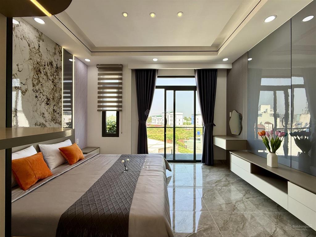 Nhà mặt tiền đường thông tx 38, dt4.2x14m, lửng, 3 lầu, 4pn, p. thờ, gara xe, sân thượng, 6,4 ty