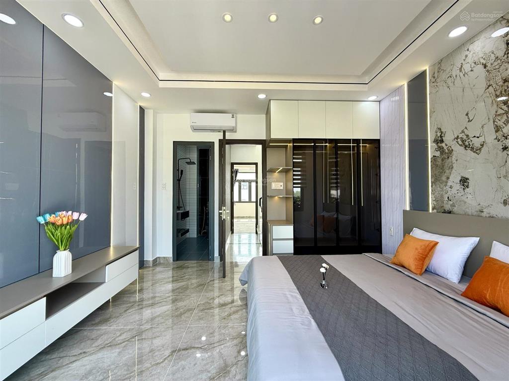 Nhà mặt tiền đường thông tx 38, dt4.2x14m, lửng, 3 lầu, 4pn, p. thờ, gara xe, sân thượng, 6,4 ty