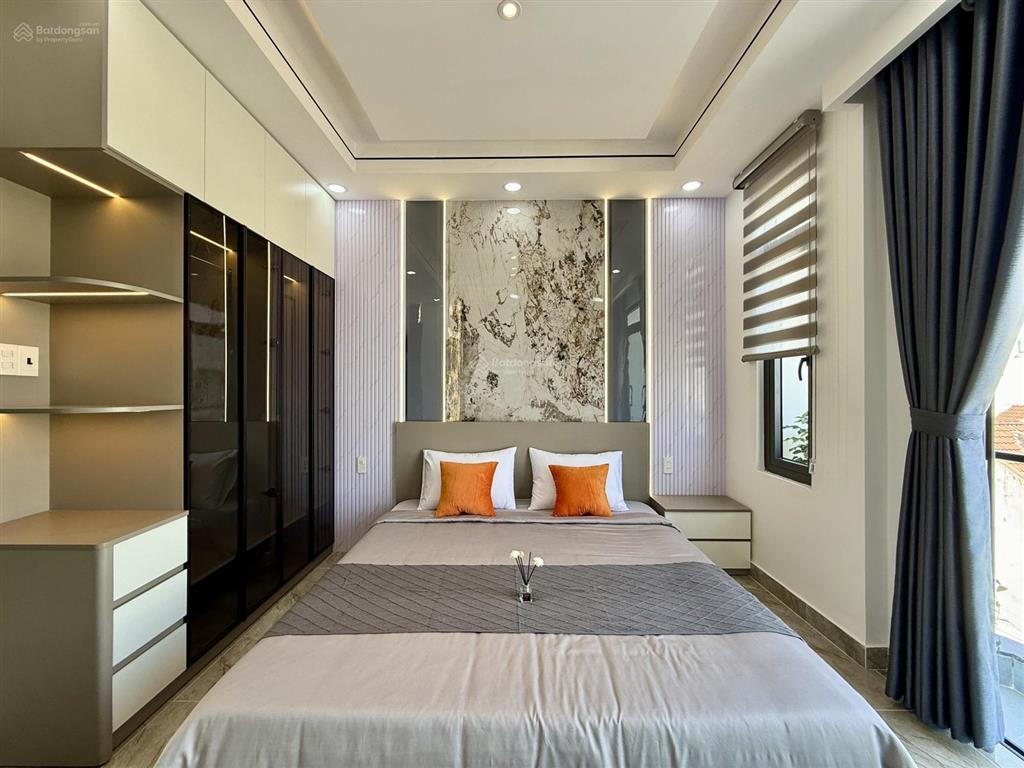 Nhà mặt tiền đường thông tx 38, dt4.2x14m, lửng, 3 lầu, 4pn, p. thờ, gara xe, sân thượng, 6,4 ty