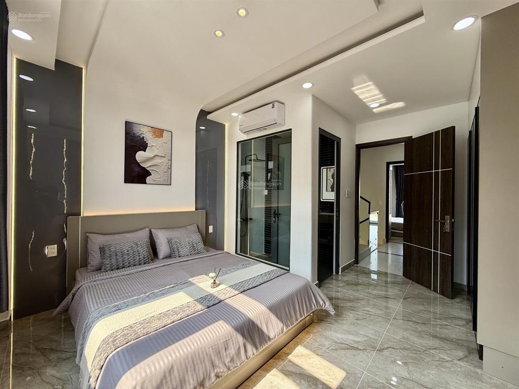 Nhà mặt tiền đường thông tx 38, dt4.2x14m, lửng, 3 lầu, 4pn, p. thờ, gara xe, sân thượng, 6,4 ty