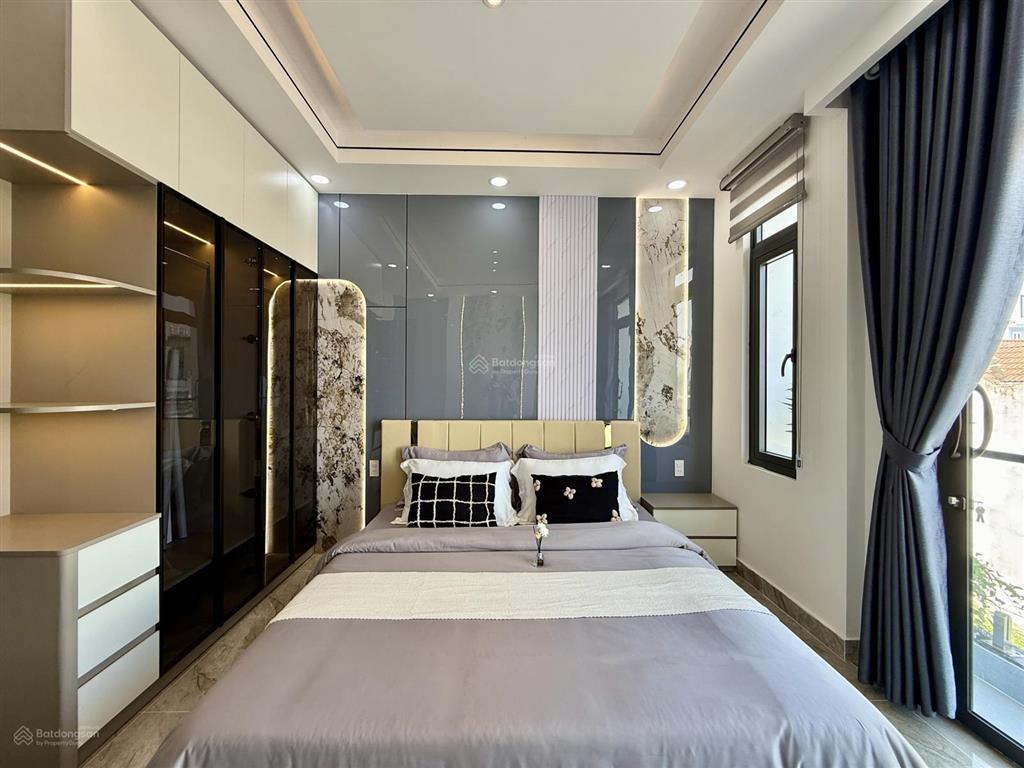 Nhà mặt tiền đường thông tx 38, dt4.2x14m, lửng, 3 lầu, 4pn, p. thờ, gara xe, sân thượng, 6,4 ty
