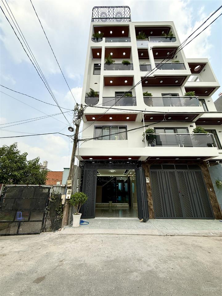 Nhà có thang máy, kế bên bện viện q12, dt4x20m, lửng, 3 lầu, 4pn, gara ô tô, sân thượng, 8,85 tỷ