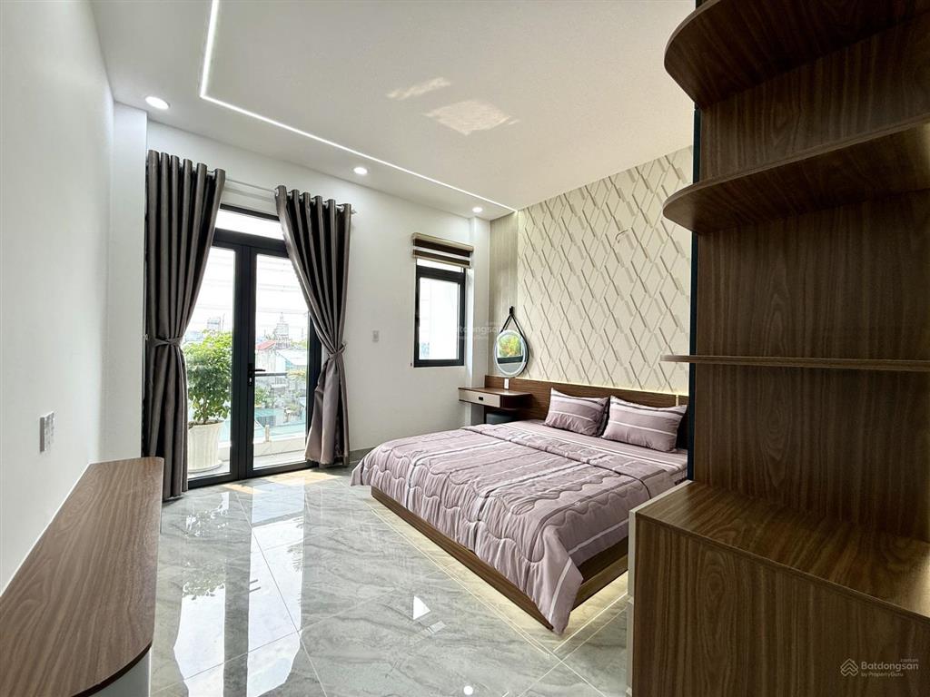 Nhà có thang máy, kế bên bện viện q12, dt4x20m, lửng, 3 lầu, 4pn, gara ô tô, sân thượng, 8,85 tỷ