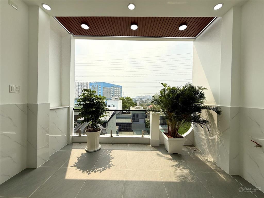 Nhà có thang máy, kế bên bện viện q12, dt4x20m, lửng, 3 lầu, 4pn, gara ô tô, sân thượng, 8,85 tỷ