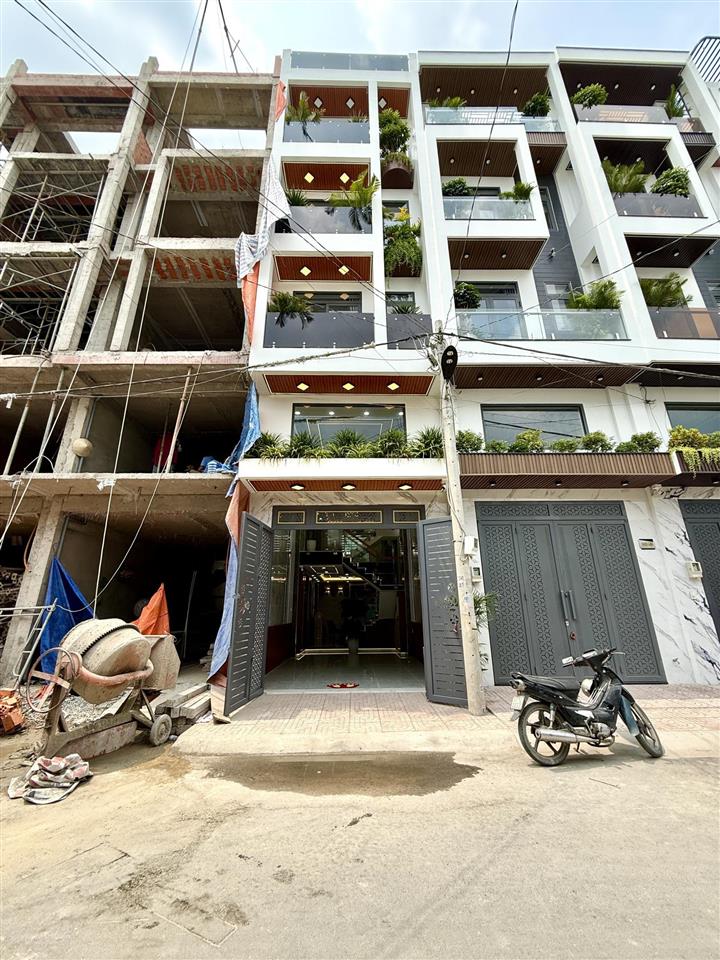 Nhà ngay bên ubp và trường học, dt4x15m, lửng, 3 lầu, 4pn, p.xông hơi, gara ô tô, p.thờ, 6.7 ty