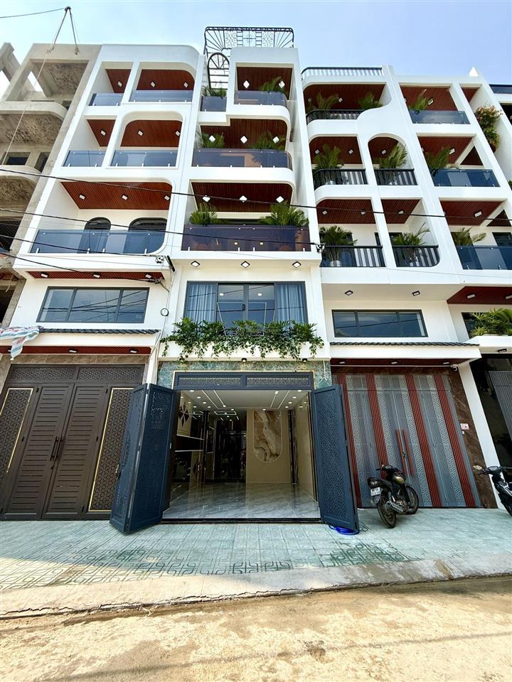Nhà bên trường tiểu học, sẹc ngắn trần thị cờ, dt4mx20m, lửng, 3 lầu, 4pn, có thang máy, hướng bắc