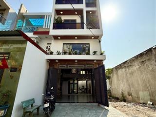 Nhà có thang máy, đường thông, bên trường học, dt5mx20m, lửng, 3 lầu, 4pn, phòng thờ, gara ô tô