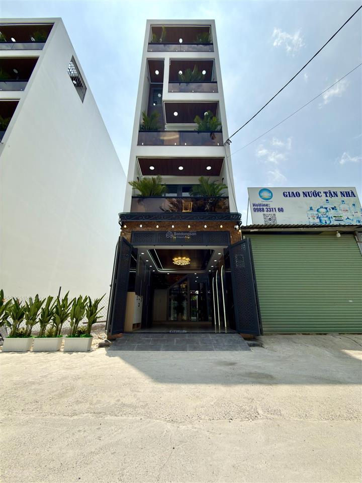 Nhà có thang máy, đường thông ngay trung tâm phường, dt4x20m, lửng, 3 lầu, 4pn, p.thờ, gara xe.