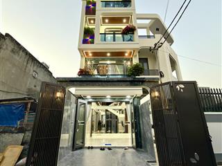 Nhà có thang máy, đường thông, bên chung cư thạnh lộc, dt4x20m, lửng, 4 lầu, 6pn, sân thượng