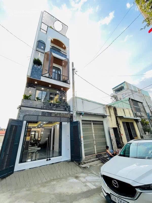 Nhà bên dự án công viên 120ha, dt4x15m, lửng, 3 lầu, 4pn, gara ô tô, p.thờ, sân thượng, 6.45 tỷ