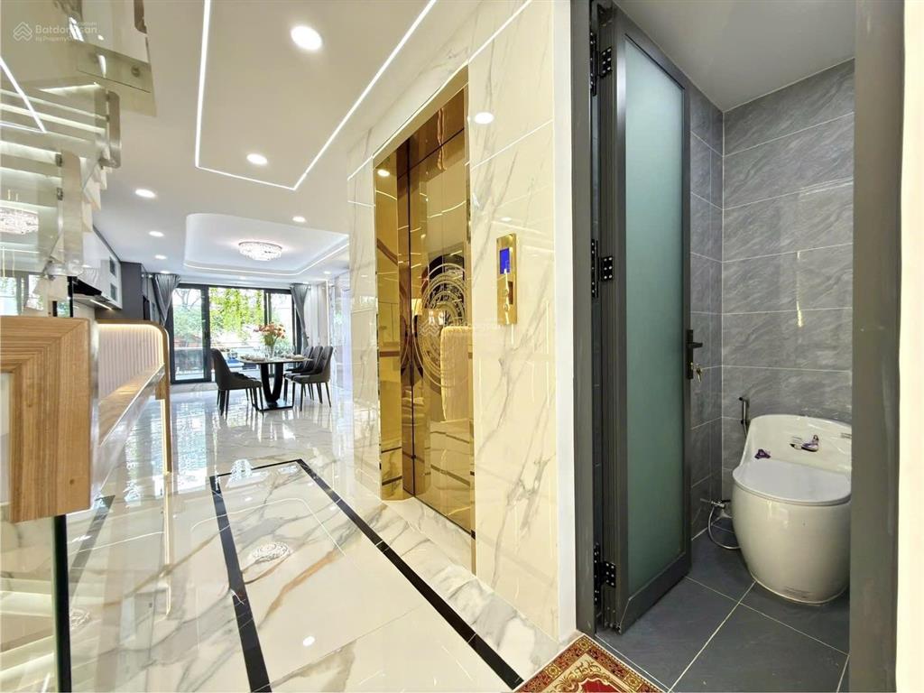 Nhà có thang máy đường thông thạnh lộc 15, dt 4x20m, lửng, 3 lầu, 4pn, p.thờ, s.thượng, hướng tnam