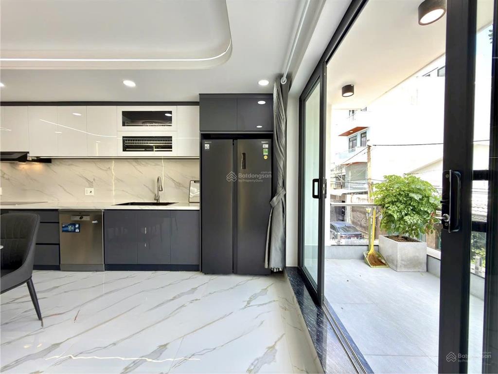 Nhà có thang máy đường thông thạnh lộc 15, dt 4x20m, lửng, 3 lầu, 4pn, p.thờ, s.thượng, hướng tnam