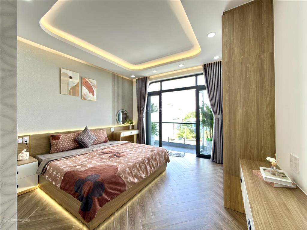 Nhà có thang máy mtkd đường thới an 12, dt 4x25m, lửng, 4 lầu, 5pn p. thờ, 7vs, hướng bắc, 8,4 tỷ